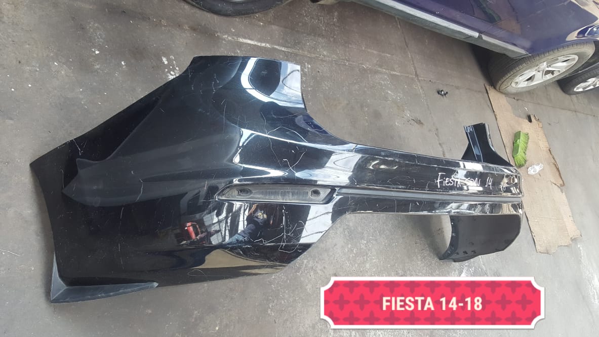 PARACHOQUES POSTERIOR FORD FIESTA SEDAN 2014 AL 2018